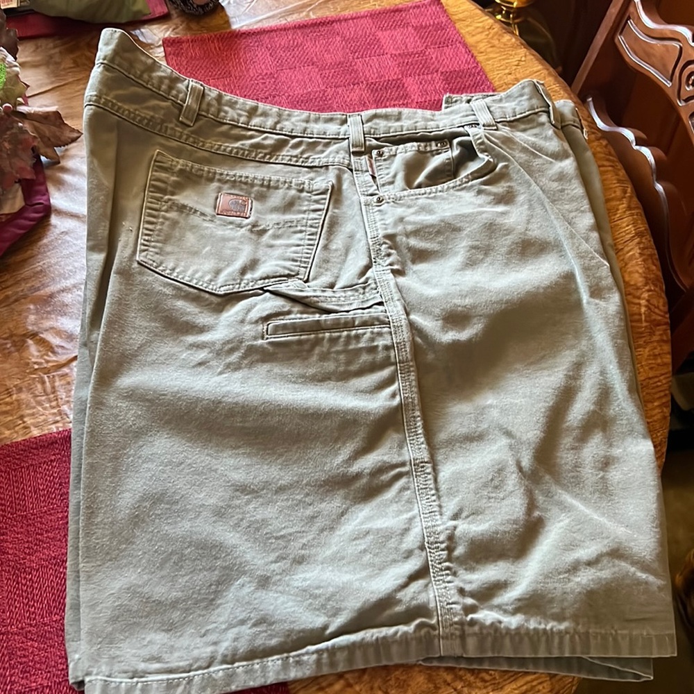 Men’s shorts size 50. Color is army green. Fabric is very sturdy cotton.